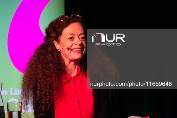 Shelly Kupferberg, a German journalist, appears on the stage of the theater of Tanzbrunnen in Cologne, Germany, on October 12, 2024, during...