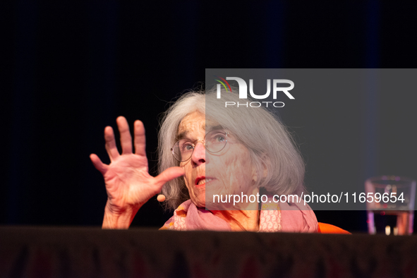 Donna Leon, an American author, is seen on the stage of the theater of Tanzbrunnen in Cologne, Germany, on October 12, 2024, during the lit....