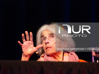 Donna Leon, an American author, is seen on the stage of the theater of Tanzbrunnen in Cologne, Germany, on October 12, 2024, during the lit....