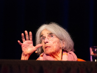 Donna Leon, an American author, is seen on the stage of the theater of Tanzbrunnen in Cologne, Germany, on October 12, 2024, during the lit....