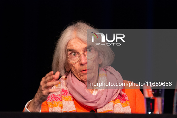 Donna Leon, an American author, is seen on the stage of the theater of Tanzbrunnen in Cologne, Germany, on October 12, 2024, during the lit....