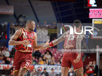 Umana Reyer's Mfiondo Kabangele and Umana Reyer's Davide Moretti participate in the Italian LBA basketball championship match between Umana...