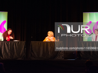 Shelly Kupferberg, a German journalist, Donna Leon, an American author, and Annett Renneberg, a German actress, are on the stage of the thea...