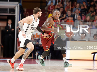 Umana Reyer's Carl Wheatle competes against Virtus Bologna's Isaia Cordinier during the Italian LBA basketball championship match between Um...