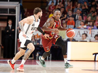 Umana Reyer's Carl Wheatle competes against Virtus Bologna's Isaia Cordinier during the Italian LBA basketball championship match between Um...