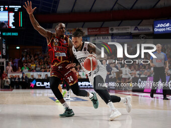 Daniel Hackett of Virtus Bologna plays against Carl Wheatle of Umana Reyer during the Italian LBA basketball championship match between Uman...