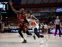 Daniel Hackett of Virtus Bologna plays against Carl Wheatle of Umana Reyer during the Italian LBA basketball championship match between Uman...