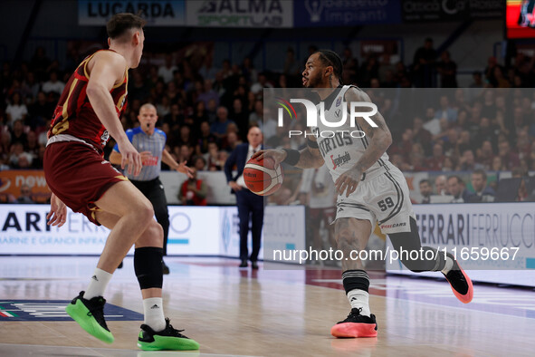 Rayjon Tucker of Virtus Bologna plays against Davide Casarin of Umana Reyer during the Italian LBA basketball championship match between Uma...