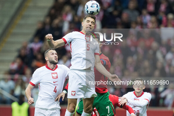 Sebastian Walukiewicz , Jan Bednarek  during UEFA Nations League match Poland vs Portugal in Warsaw Poland on 12 October 2024. 