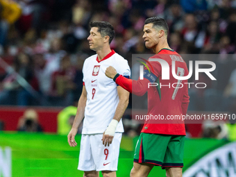 Cristiano Ronaldo reacts after scoring a goal while Robert Lewandowski looks on during the UEFA 2024 UEFA Nations League Group A1 match betw...