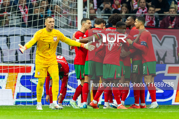 The Portugal national team celebrates after scoring a goal during the UEFA Nations League 2024 Group A A1 match between Poland and Portugal...