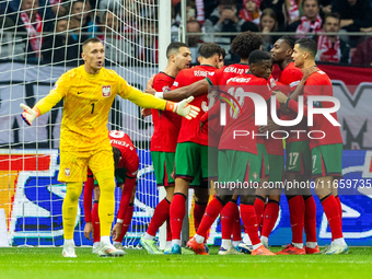 The Portugal national team celebrates after scoring a goal during the UEFA Nations League 2024 Group A A1 match between Poland and Portugal...