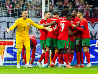 The Portugal national team celebrates after scoring a goal during the UEFA Nations League 2024 Group A A1 match between Poland and Portugal...