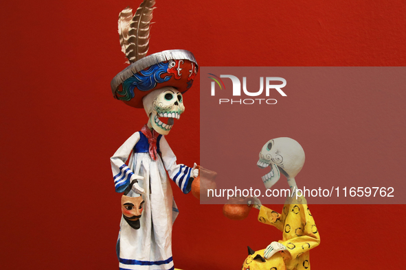 Skulls made of cardboard are seen at the exhibition ''The Other Life in Tamoanchan'' at the National Museum of Popular Cultures in Mexico Ci...