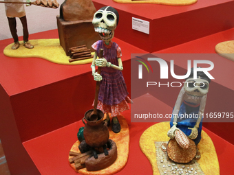 Skulls made of cardboard are seen at the exhibition ''The Other Life in Tamoanchan'' at the National Museum of Popular Cultures in Mexico Ci...