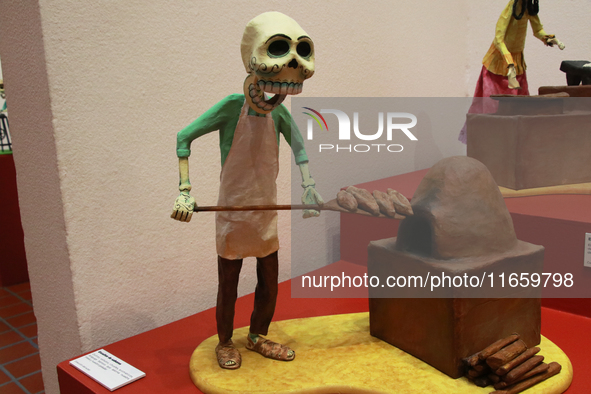 A cardboard skull made by a baker is seen at the exhibition ''The Other Life in Tamoanchan'' at the National Museum of Popular Cultures in M...