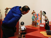 A man looks at the exhibition ''The Other Life in Tamoanchan'' at the National Museum of Popular Cultures in Mexico City, Mexico, on October...