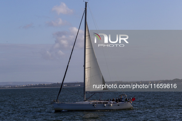 A sailboat is seen near Lisbon, Portugal, on October 12, 2024. Russian missile strikes on Ukrainian ports this week kill at least 10 people...