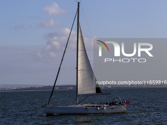 A sailboat is seen near Lisbon, Portugal, on October 12, 2024. Russian missile strikes on Ukrainian ports this week kill at least 10 people...