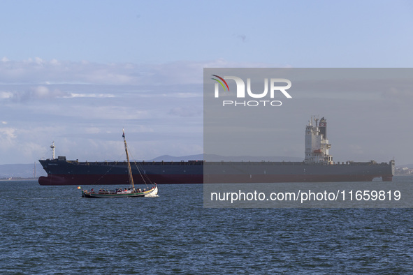 A cargo ship is seen near Lisbon, Portugal, on October 12, 2024. Russian missile strikes on Ukrainian ports this week kill at least 10 peopl...