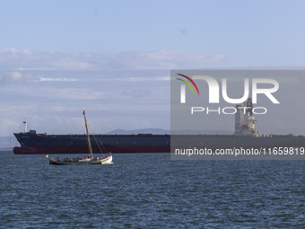 A cargo ship is seen near Lisbon, Portugal, on October 12, 2024. Russian missile strikes on Ukrainian ports this week kill at least 10 peopl...