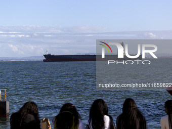 A cargo ship is seen near Lisbon, Portugal, on October 12, 2024. Russian missile strikes on Ukrainian ports this week kill at least 10 peopl...