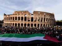 Members of the Palestinian student movement in Italy participate in a demonstration in the center of Rome to show their support for the Pale...