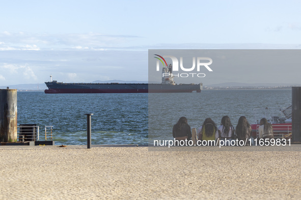 A cargo ship is seen near Lisbon, Portugal, on October 12, 2024. Russian missile strikes on Ukrainian ports this week kill at least 10 peopl...