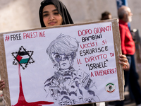 Members of the Palestinian student movement in Italy participate in a demonstration in the center of Rome to show their support for the Pale...