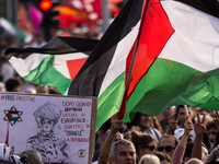 Members of the Palestinian student movement in Italy participate in a demonstration in the center of Rome to show their support for the Pale...