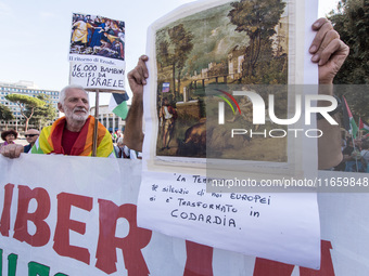 Members of the Palestinian student movement in Italy participate in a demonstration in the center of Rome to show their support for the Pale...