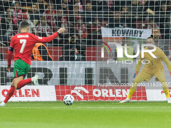 Cristiano Ronaldo , Lukasz Skorupski  during UEFA Nations League match Poland vs Portugal in Warsaw Poland on 12 October 2024. (