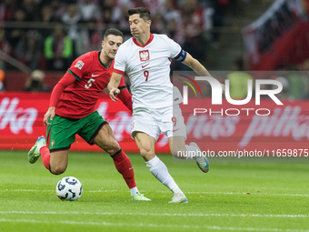 Diogo Dalot , Robert Lewandowski  during UEFA Nations League match Poland vs Portugal in Warsaw Poland on 12 October 2024. (