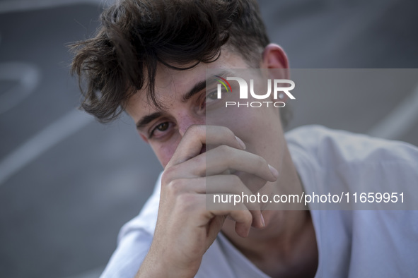 An Iranian participant waits to perform in a freestyle bicycle competition at the Navid BMX Bike Park in southern Tehran, Iran, on October 1...