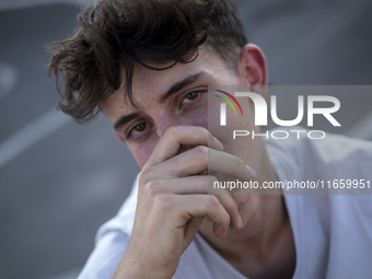 An Iranian participant waits to perform in a freestyle bicycle competition at the Navid BMX Bike Park in southern Tehran, Iran, on October 1...