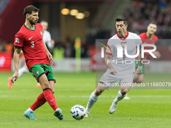 Ruben Dias , Robert Lewandowski  during UEFA Nations League match Poland vs Portugal in Warsaw Poland on 12 October 2024. (