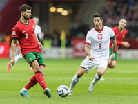 Ruben Dias , Robert Lewandowski  during UEFA Nations League match Poland vs Portugal in Warsaw Poland on 12 October 2024. (