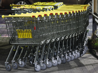 Shopping trolleys are seen near the shop in Inwald, Poland on October 12, 2024. (