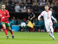 Bernardo Silva , Sebastian Szymanski  during UEFA Nations League match Poland vs Portugal in Warsaw Poland on 12 October 2024. (