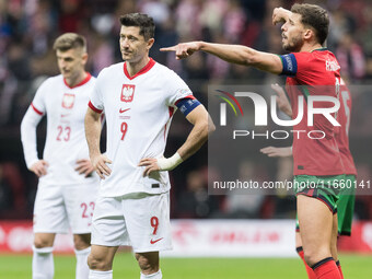 Robert Lewandowski , Ruben Dias  during UEFA Nations League match Poland vs Portugal in Warsaw Poland on 12 October 2024. (