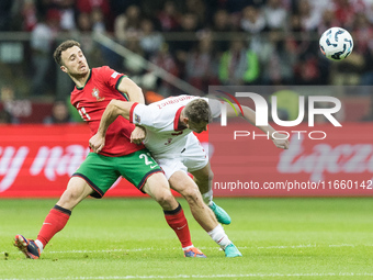 Diogo Jota , Pawel Dawidowicz  during UEFA Nations League match Poland vs Portugal in Warsaw Poland on 12 October 2024. (