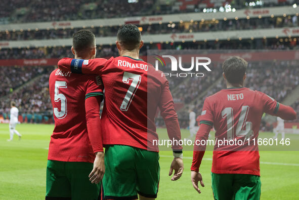 Diogo Dalot , Cristiano Ronaldo , Pedro Neto  during UEFA Nations League match Poland vs Portugal in Warsaw Poland on 12 October 2024. 