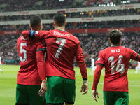 Diogo Dalot , Cristiano Ronaldo , Pedro Neto  during UEFA Nations League match Poland vs Portugal in Warsaw Poland on 12 October 2024. (