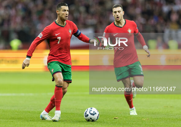 Cristiano Ronaldo , Diogo Dalot  during UEFA Nations League match Poland vs Portugal in Warsaw Poland on 12 October 2024. 