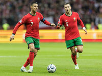 Cristiano Ronaldo , Diogo Dalot  during UEFA Nations League match Poland vs Portugal in Warsaw Poland on 12 October 2024. (