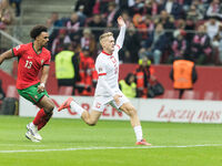 Renato Veiga , Karol Swiderski  during UEFA Nations League match Poland vs Portugal in Warsaw Poland on 12 October 2024. (