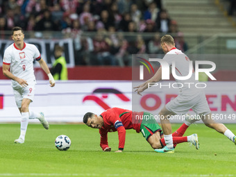 Cristiano Ronaldo , Pawel Dawidowicz  during UEFA Nations League match Poland vs Portugal in Warsaw Poland on 12 October 2024. (