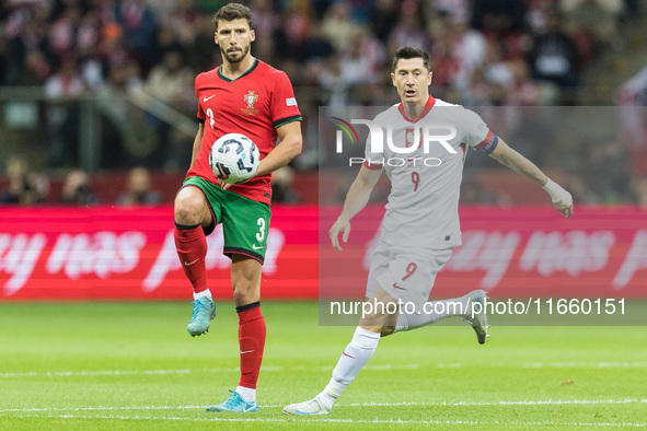 Ruben Dias , Robert Lewandowski  during UEFA Nations League match Poland vs Portugal in Warsaw Poland on 12 October 2024. 