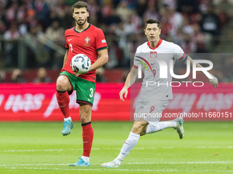 Ruben Dias , Robert Lewandowski  during UEFA Nations League match Poland vs Portugal in Warsaw Poland on 12 October 2024. (