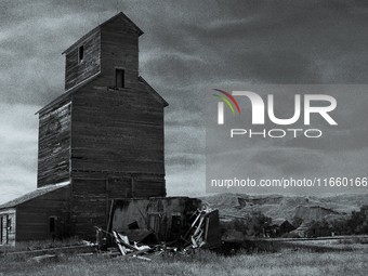 An abandoned grain elevator is in the ghost town of Owanka, South Dakota, USA. (